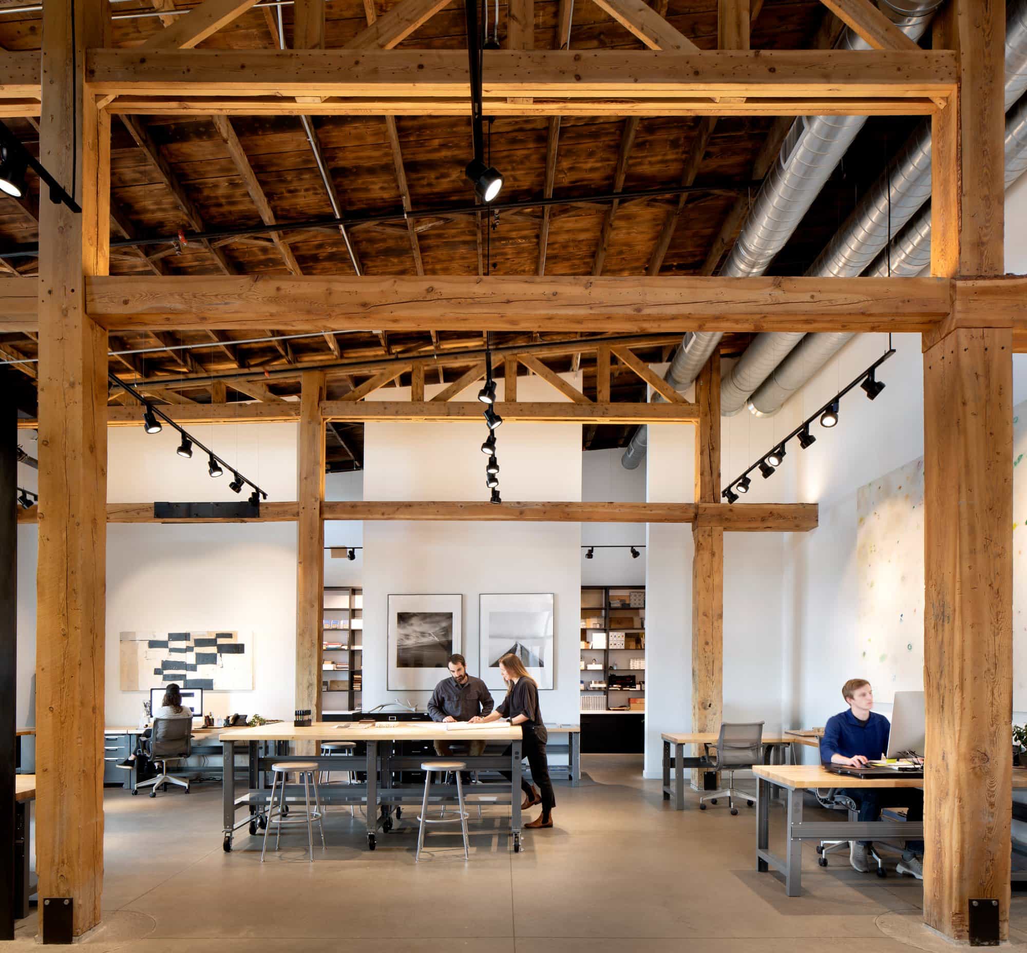 CLB Architects Bozeman — long view of the studio floor through the timber bays